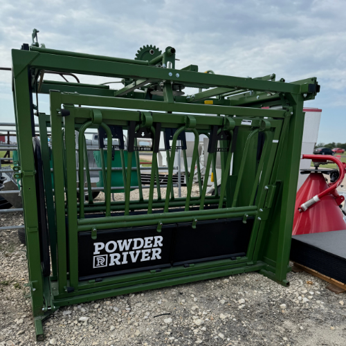 Powder River farm feeder on display outside of McGregor General Store.