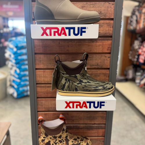 Rain boots on display inside of McGregor General store.