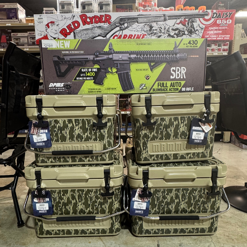 Coolers, air rifles and supplies on display inside of McGregor General Store.