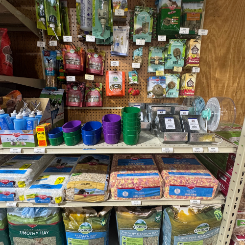 Pet food and supplies on display inside of McGregor General store.