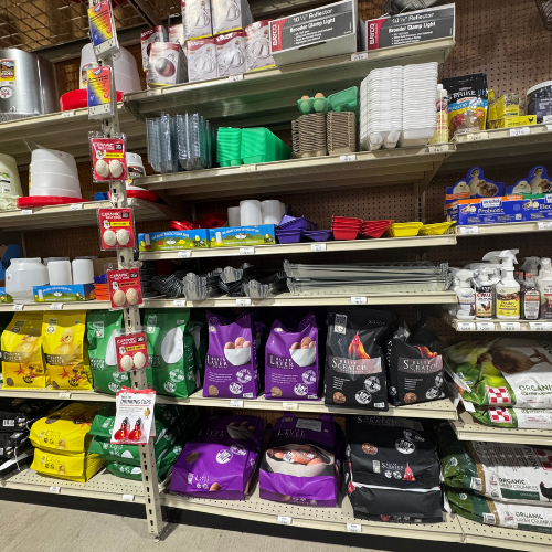 Farm feed and supplies on display inside of McGregor General Store.